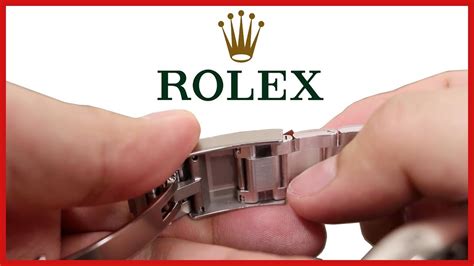 how to adjust a rolex watch band clasp